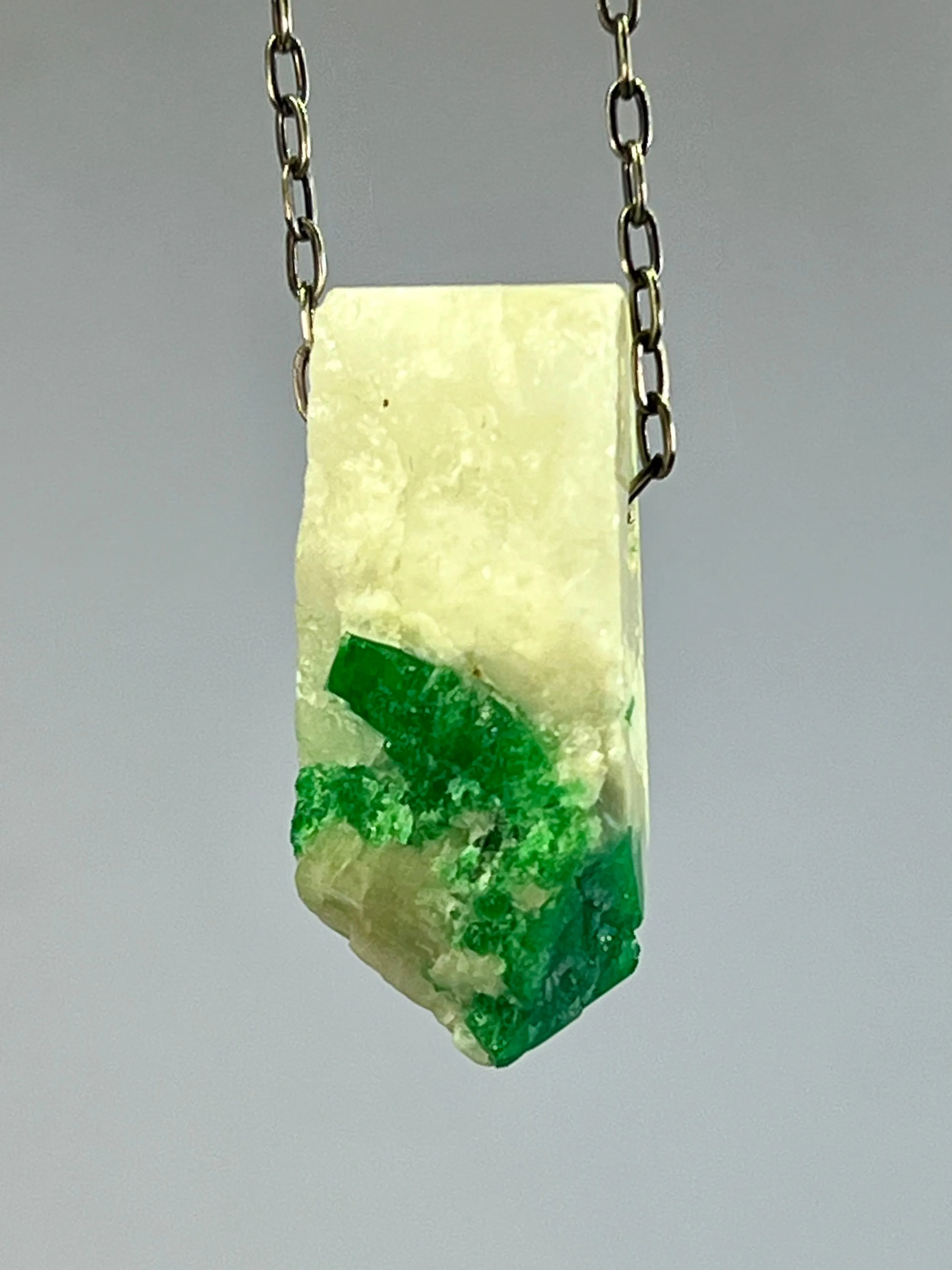 Emerald in White Quartz Crystal Necklace