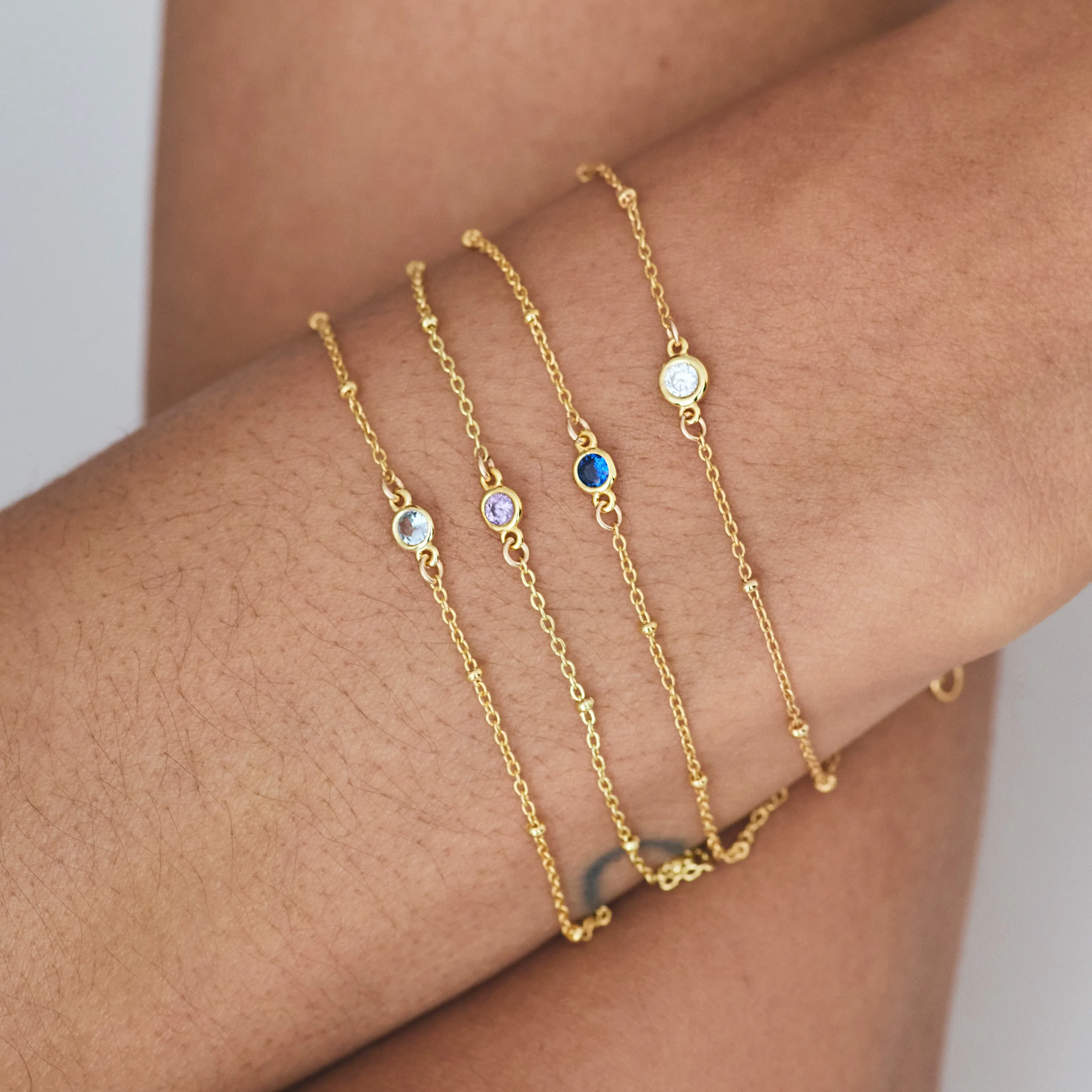 FEBRUARY BIRTHSTONE BRACELET GOLD
