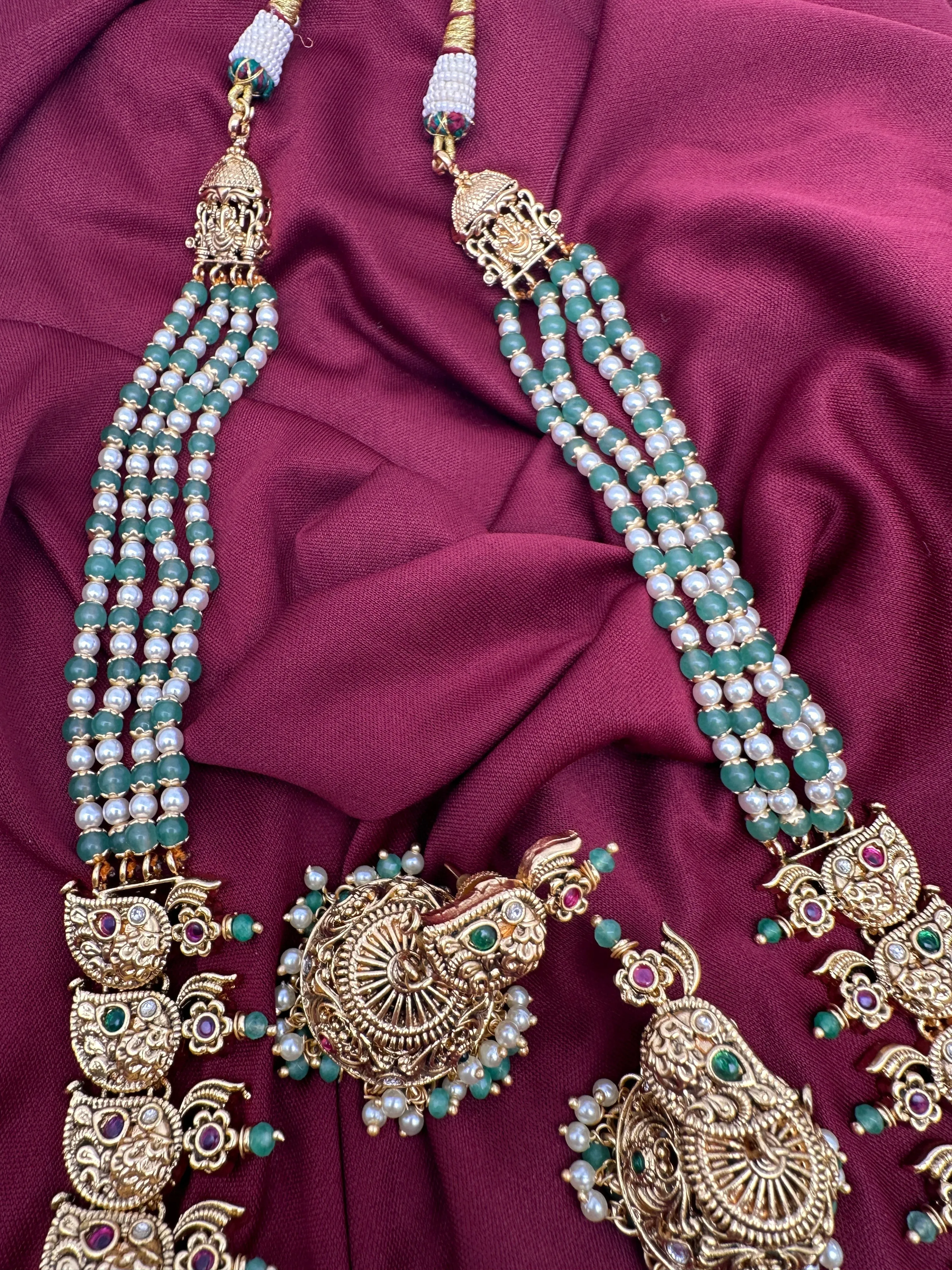 Goddess Lakshmi Ganesha Nakshi Matte Haar with Pearls and Emerald Beads
