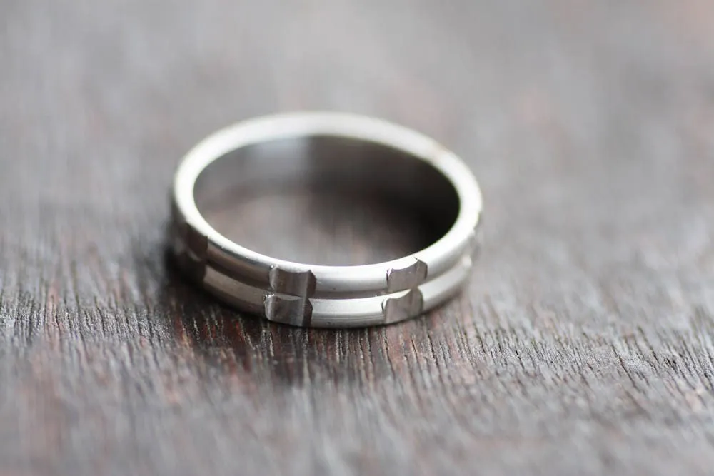 Solid gold or sterling silver wedding ring with simple lines